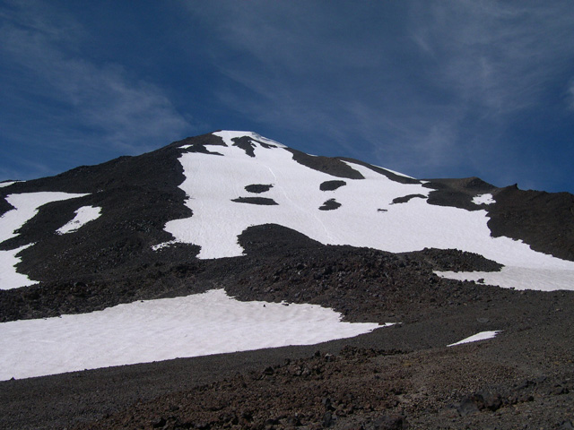 The South Face is a steep 2.300' of snow, rock and ice. Note the glissade path!