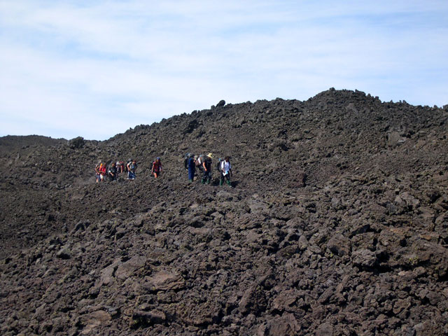 A Pacific Crest Outward Bound group hard on our heels across the remaining miles of lava.