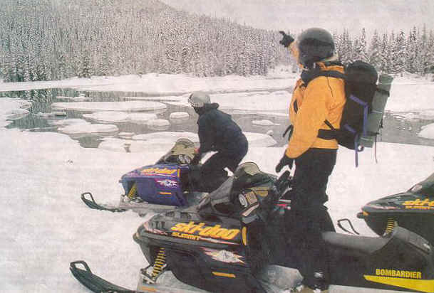 Bob Speik admires Devils Lake on snowmobile